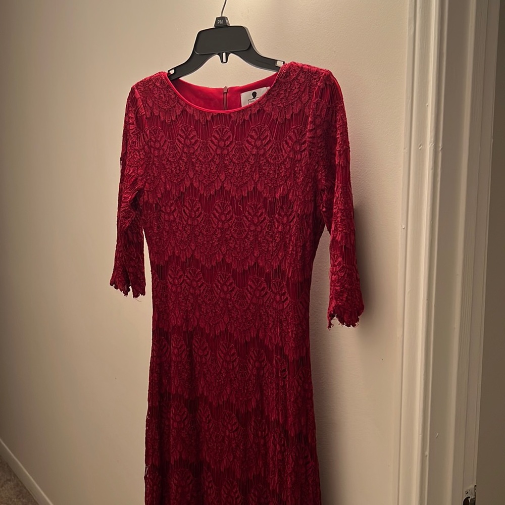 Dainty Jewell’s red lace floor length dress
